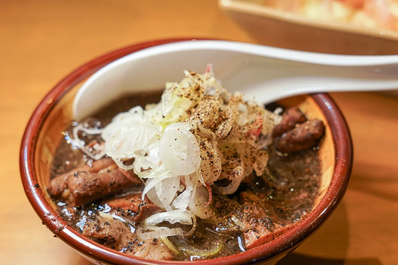 ▲黒もつ煮込み（418円）