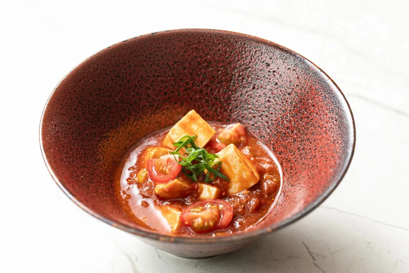 ▲コースの締め「ハーブサルシッチャを使ったトマト麻婆豆腐」