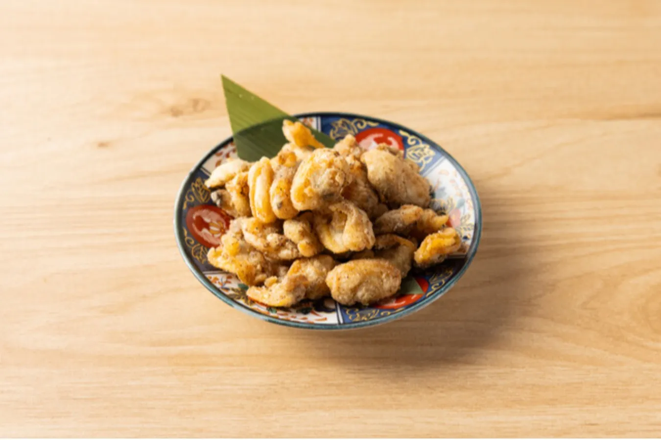 ▲「やみつきあさりの山椒揚げ」