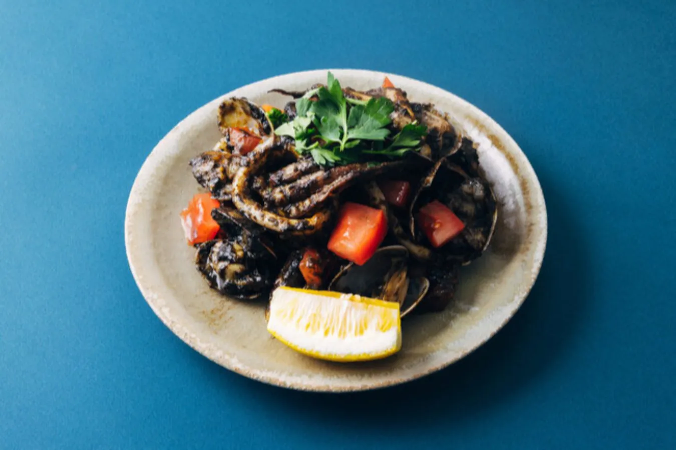 ▲「スルメイカ 肝バター焼き シチリア風」