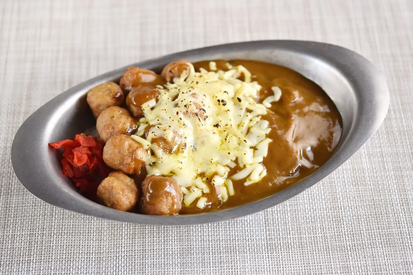▲「チーズチキンボール10個カレー」