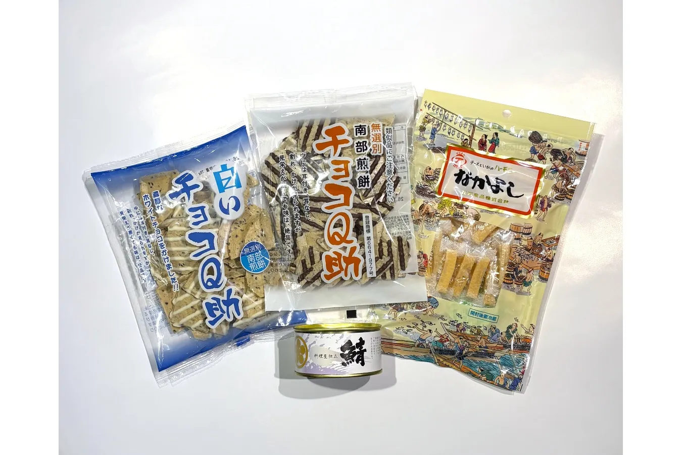 「チョコQ助」「白いチョコQ助」各360円／しんぼり、「なかよし」890円／花万食品、「鯖缶詰（水煮）」900円／割烹金剛